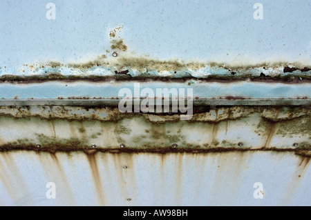 An image of a rusty iron wall in an industrial area. Stock Photo