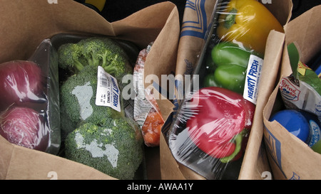 The shopping trolley full with products from the supermarket pictures images photos large high resolution horizontal in USA US hi-res Stock Photo