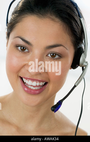 Woman using a headset Stock Photo