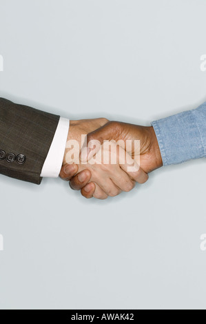 Two men shaking hands Stock Photo