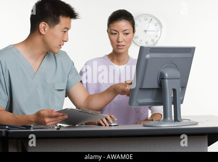 Male and female healthcare workers Stock Photo