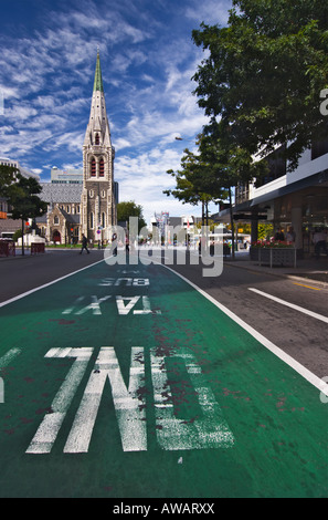 Christchurch Cathedral viewed from Columbo Street with a painted bus and taxi lane in the foreground Stock Photo