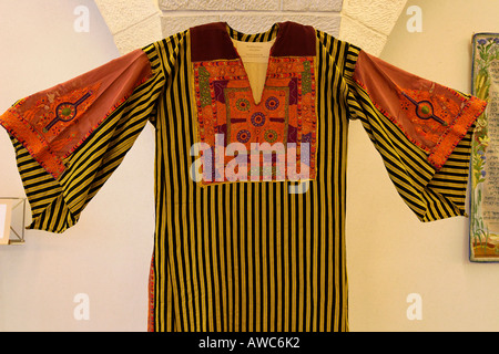 sachin and babi light blue dress Palestinian Thobe  Preserved Identity