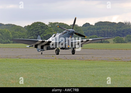 WWII Spitfire Photo recon Mark 11 in D Day Markings on display at an Airshow Stock Photo