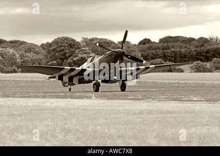 WWII Spitfire Photo recon Mark 11 in D Day Markings on display at an Airshow Stock Photo