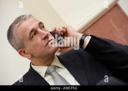 Buisnessman with mobile phone Stock Photo