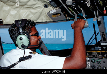 Pilot in Air Taxi Maldives Indian Ocean Meemu Atoll Stock Photo