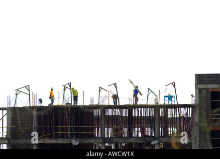 Spain Canary Islands La Palma Construction workers on carcass brick shell Stock Photo