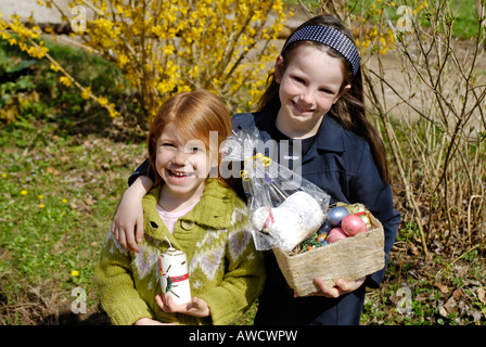 Two children with their easter basket Stock Photo