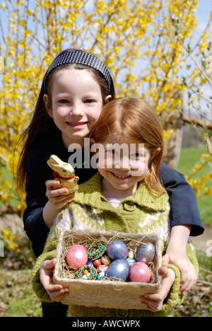 Two children with their easter basket Stock Photo