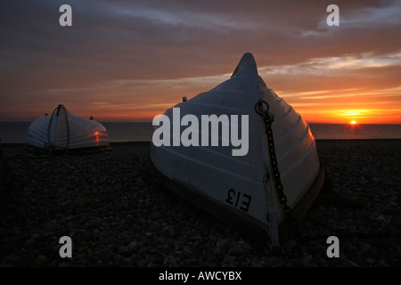 Fishing boats at sunset Stock Photo