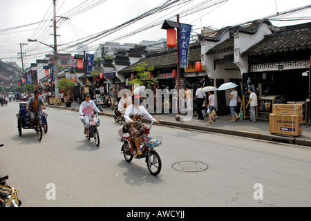 Street in the old part of Shanghai, cable chaos, little shops, traffic, Shanghai, China, Asia Stock Photo