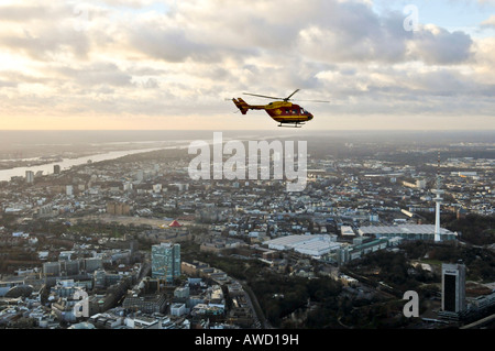 Eurocopter Medicopter BK 117 flying over Hamburg, Germany, Europe Stock Photo