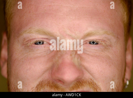 Redheaded young man's face Stock Photo