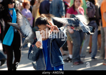 Young boy at Piazza San Marco (St. Mark's Square), Venice, Veneto, Italy, Europe Stock Photo