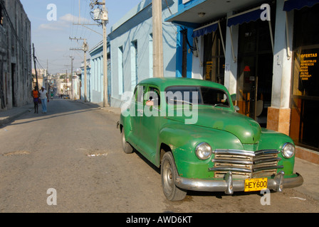 Green vintage car parked on a street in Cienfuegos, Cuba, Caribbean, Americas Stock Photo