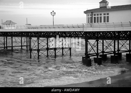 Side view along Cromer pier looking towards the sea Stock Photo