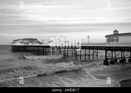 Side view along Cromer pier looking towards the Pavilion theatre Stock Photo