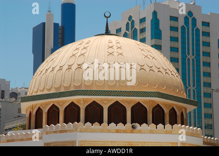 Mosque juxtaposed with skyscrapers in downtown Abu Dhabi, United Arab Emirates, Asia Stock Photo