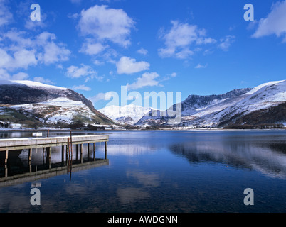 SNOWDON Yr Wyddfa from west across lake Llyn Nantlle Uchaf in winter snow Nantlle Gwynedd Snowdonia North Wales UK Stock Photo