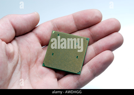 Computer processor detail close up in man hand Stock Photo