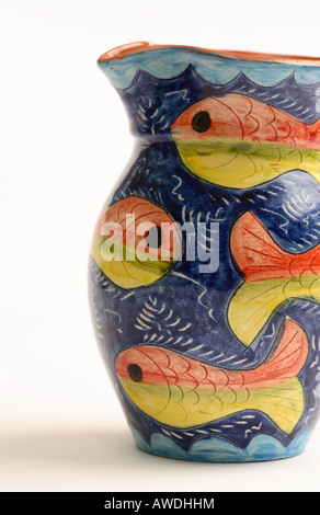 Ceramic jug with colourful fish sea marine decoration Stock Photo