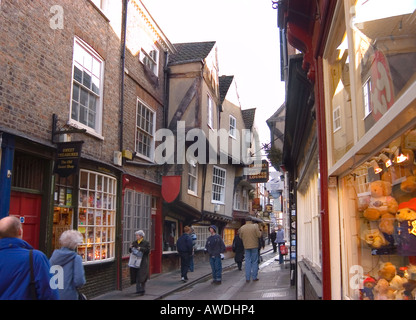 The Shambles with shoppers walking along in York City Stock Photo