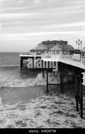 Side view along Cromer pier looking towards the Pavilion theatre Stock Photo