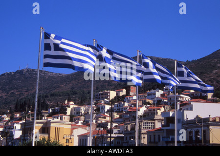 GREEK FLAGS FLY OVER SAMOS TOWN. SAMOS GREEK ISLAND Stock Photo