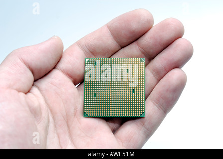 Computer processor detail close up in man hand Stock Photo