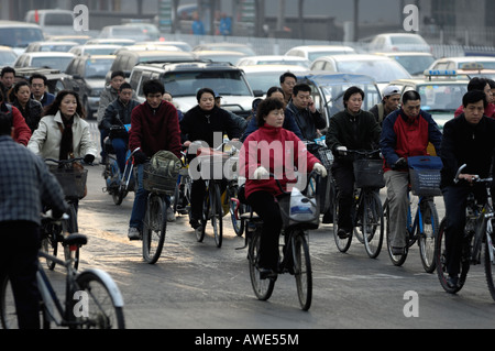 People go to work by bicycle in the morning in Beijing China. 12-Mar-2008 Stock Photo