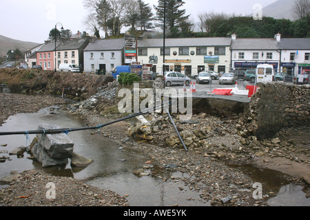 The remnants of the collapsed road bridge in Leenane after it was swept away by floodwater, County Galway, Republic of Ireland Stock Photo