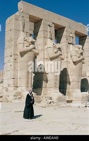 Colossal statues of the Pharaoh at the Ramesseum temple in Thebes near ...