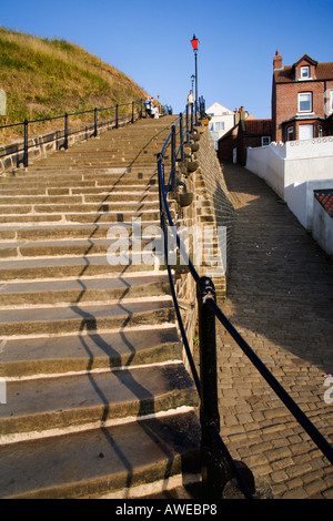 Looking up Abbey Steps in Whitby North Yorkshire England The 199 steps climb from the old town up to Whitby Abbey Stock Photo