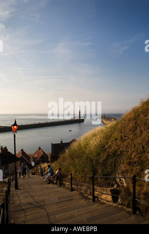 Looking Down Abbey Steps to The Harbour Whitby North Yorkshire England The 199 steps climb from the old town up to Whitby Abbey Stock Photo
