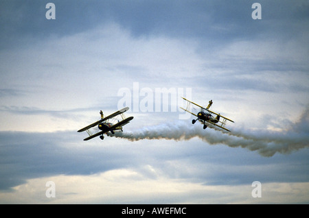 Aerial shot of two Boeing PT-17 Stearman biplanes with wingwalkers Stock Photo