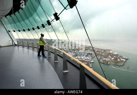 Site Supervisor Mike Homer views the old town from Portsmouth's newly completed Spinnaker Tower at Gun Wharf Quay Stock Photo