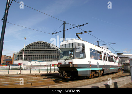 Manchester G Mex Centre old Central Station and moving Metrolink Tram Stock Photo