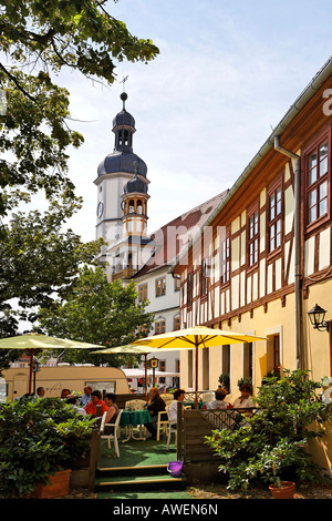 Café with Fachwerk-style houses in the historic centre of Eisenberg, Thuringia, Germany, Europe Stock Photo