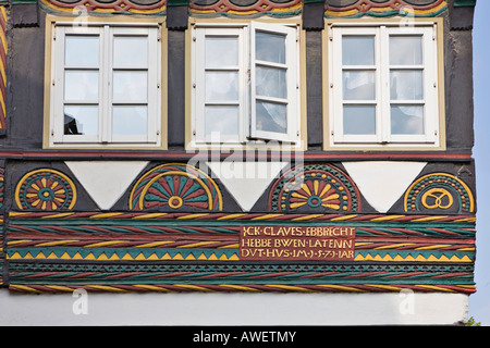 Detailed view of an ornate Fachwerk-style (timber-framed, half-timbered) house built 1571 in Einbeck, Lower Saxony, Germany, Eu Stock Photo