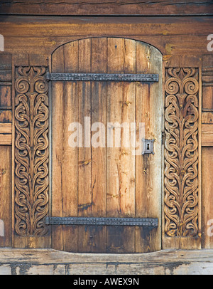 Carved wooden portal, Heddal Stave Church (Heddal Stavkirke Stock Photo