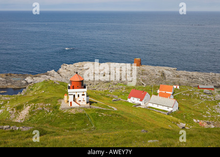 Lighthouse and farm buildings, Runde Island, Norway, Scandinavia, Europe Stock Photo