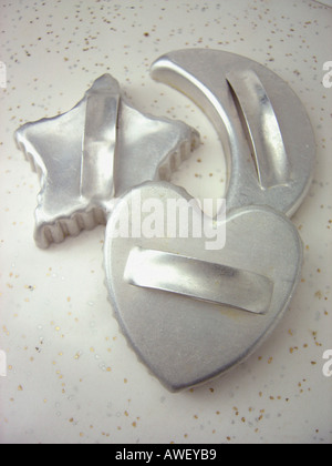 Three 3 Vintage Cookie Biscuit Cutters Star Crescent Moon and Heart Stock Photo