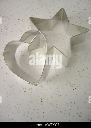 Two 2 Modern Cookie Biscuit Cutters Heart and Star Copy Space Stock Photo