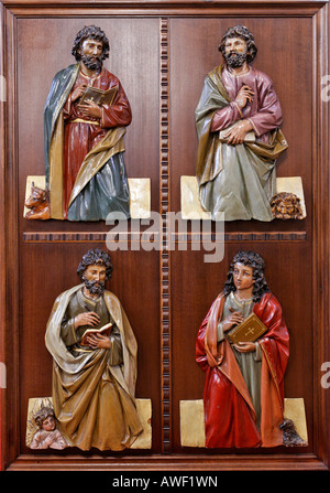 Four Evangelists carved onto a lectern at the church in Hirtenberg, Triesingtal (Triesing Valley), Lower Austria, Austria, Euro Stock Photo