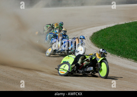 Motorcycle sidecars, international motorcycle race on a dirt track speedway in Muehldorf am Inn, Upper Bavaria, Bavaria, German Stock Photo