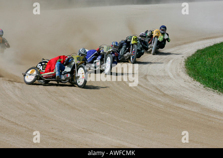 Motorcycle sidecars, international motorcycle race on a dirt track speedway in Muehldorf am Inn, Upper Bavaria, Bavaria, German Stock Photo