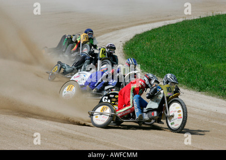 Motorcycle sidecars, international motorcycle race on a dirt track speedway in Muehldorf am Inn, Upper Bavaria, Bavaria, German Stock Photo