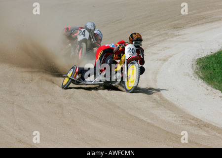 Motorcycle sidecars, international motorcycle race on a dirt track speedway in Muehldorf am Inn, Upper Bavaria, Bavaria, German Stock Photo