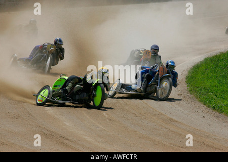 Motorcycle sidecars, international motorcycle race on a dirt track speedway in Muehldorf am Inn, Upper Bavaria, Bavaria, German Stock Photo